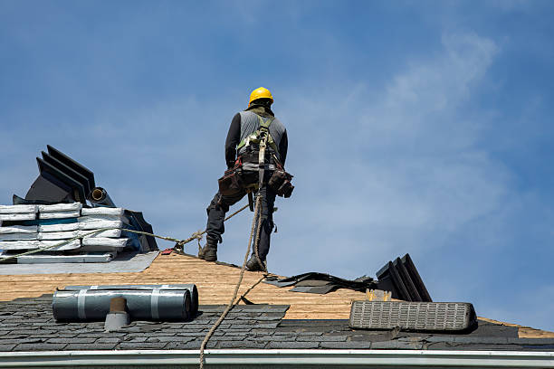 Professional Gutter Installation technician working in Elba, NY